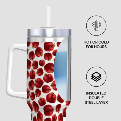 Insulated tumbler with red apple pattern on a white background