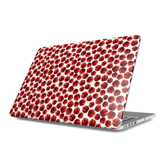 Laptop with a red polka dot pattern on a white background