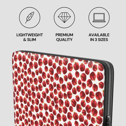 Laptop sleeve with red fruit pattern and feature icons on a light gray background