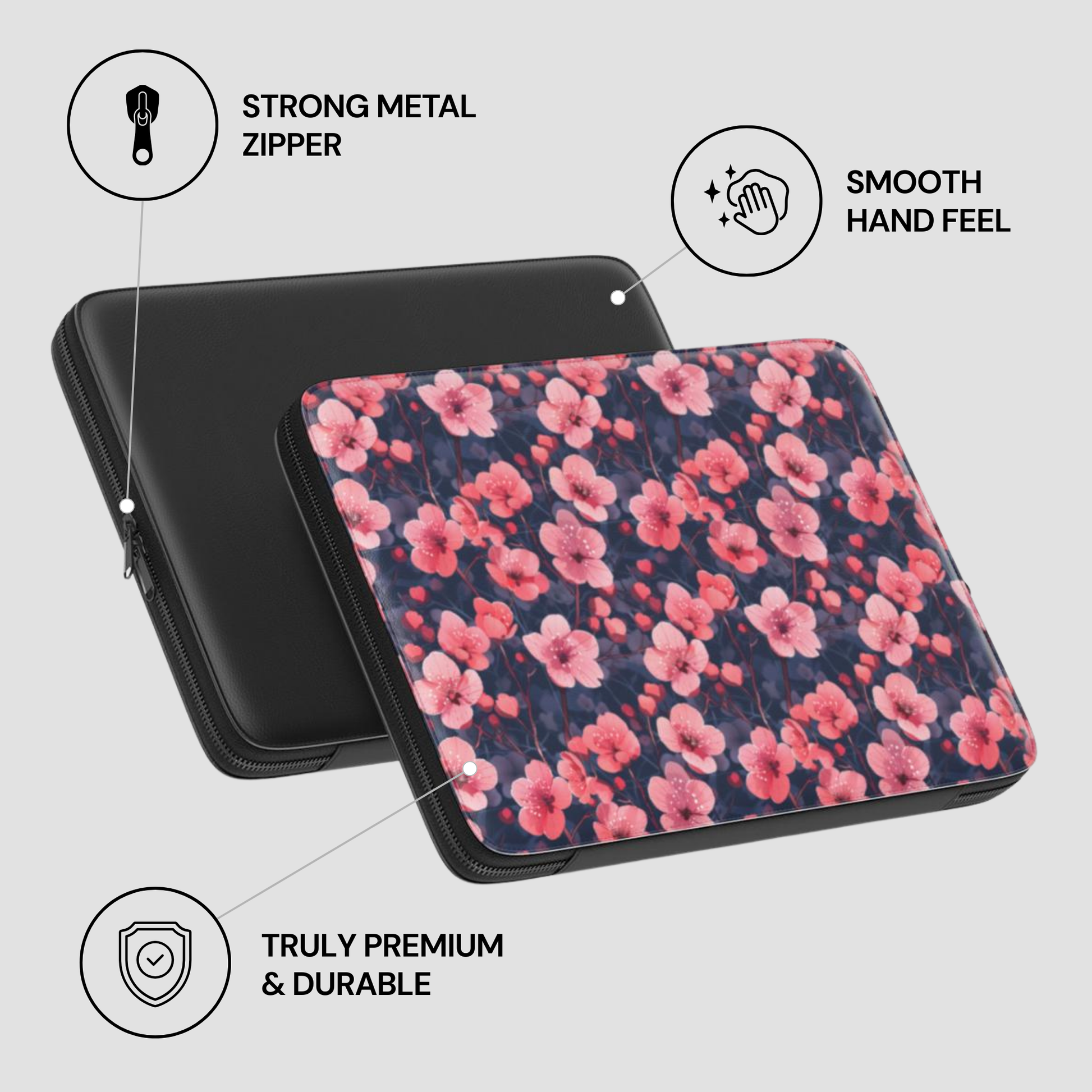 Floral laptop case with black zipper on a light gray background