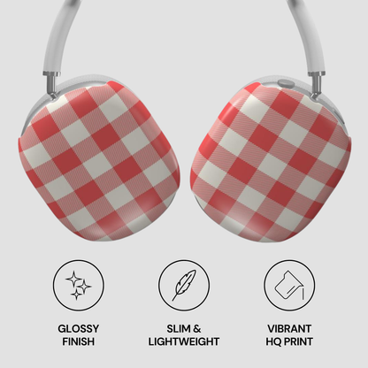 Red and white checkered over-ear headphones shown from the back, with three feature icons below reading 'Glossy Finish', 'Slim & Lightweight', and 'Vibrant HQ Print' on a light gray background.