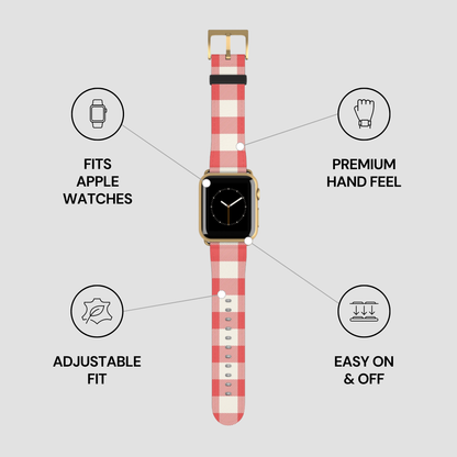 A smartwatch with a red and white gingham check strap, shown on a light gray background with four feature callouts: 'FITS APPLE WATCHES,' 'PREMIUM HAND FEEL,' 'ADJUSTABLE FIT,' and 'EASY ON & OFF.'.