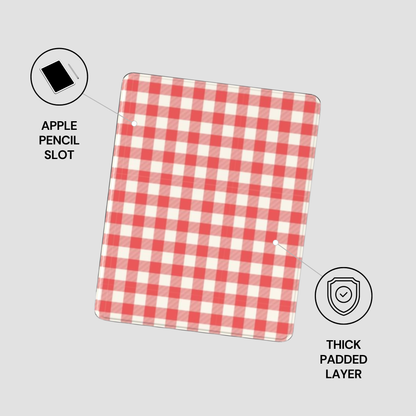 A red and white gingham checkered tablet skin or mouse pad shown on a light gray background, with callout icons and text indicating an Apple Pencil Slot and Thick Padded Layer.