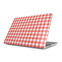 A silver laptop with a red and white gingham checkered skin on the outer lid, shown at an angle on a white background.