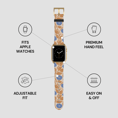 A smartwatch with a tan and blue floral patterned strap, shown on a light gray background with feature callouts that say it fits Apple watches, has a premium hand feel, is adjustable fit, and is easy on and off.