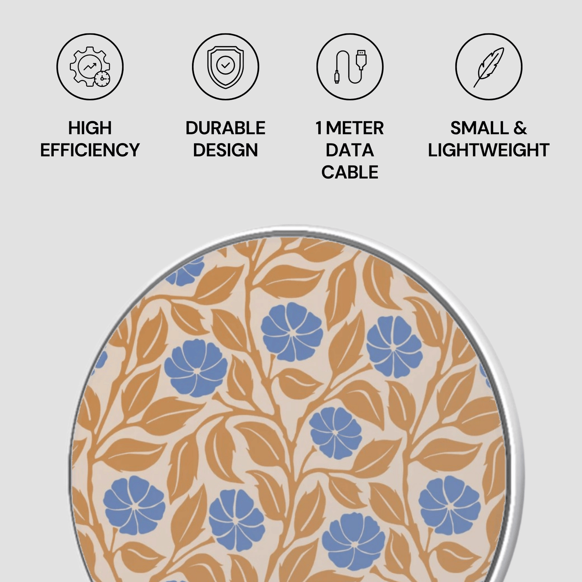 A round patterned data cable shown on a light gray background with four feature icons and text above: high efficiency, durable design, 1 meter data cable, and small & lightweight. The cable has a beige base with a blue floral and tan leaf pattern.