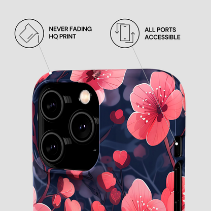 Phone case with pink floral design on a blue background, featuring icons and text about print quality and port accessibility.
