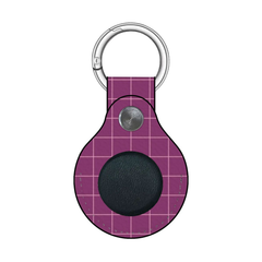 Purple grid-patterned keychain with a black circle and silver ring on a white background