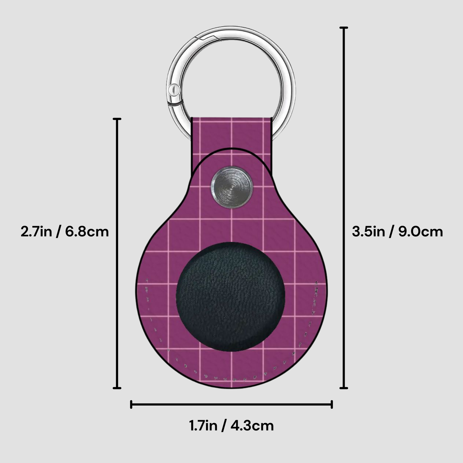 Purple keychain with measurements on a gray background