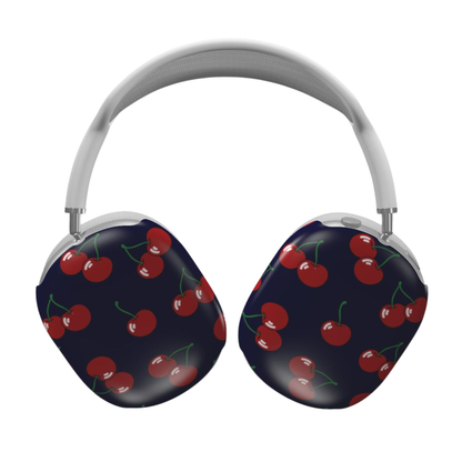 Headphones with cherry pattern on a dark blue background