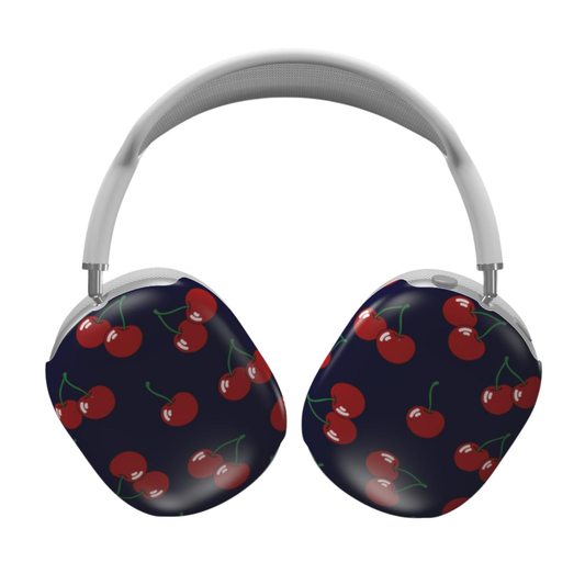 Headphones with cherry pattern on a dark blue background