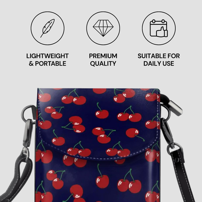 Blue pouch with red cherry pattern on a light gray background