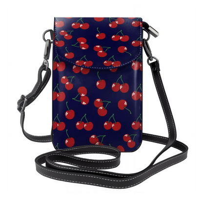 Crossbody bag with cherry pattern on a blue background