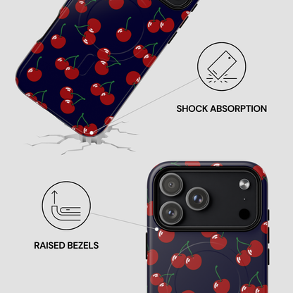 Phone case with cherry pattern showing shock absorption and raised bezels features.
