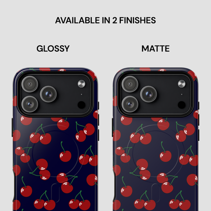 Two phone case designs with cherry pattern, one glossy and one matte, on a white background.