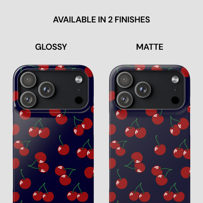 Phone case with cherry pattern in glossy and matte finishes on a white background