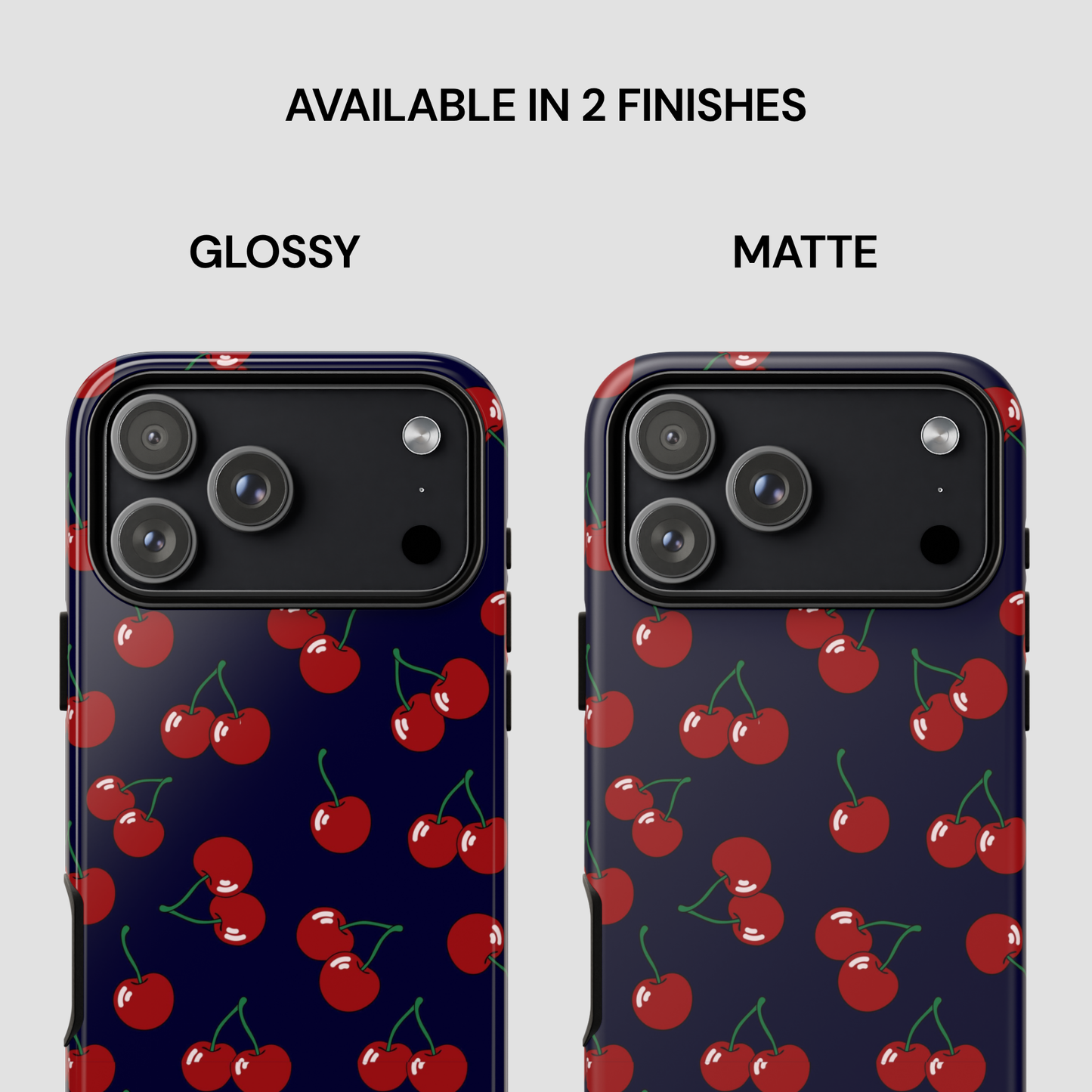 Two phone cases with cherry pattern, one glossy and one matte, on a white background.