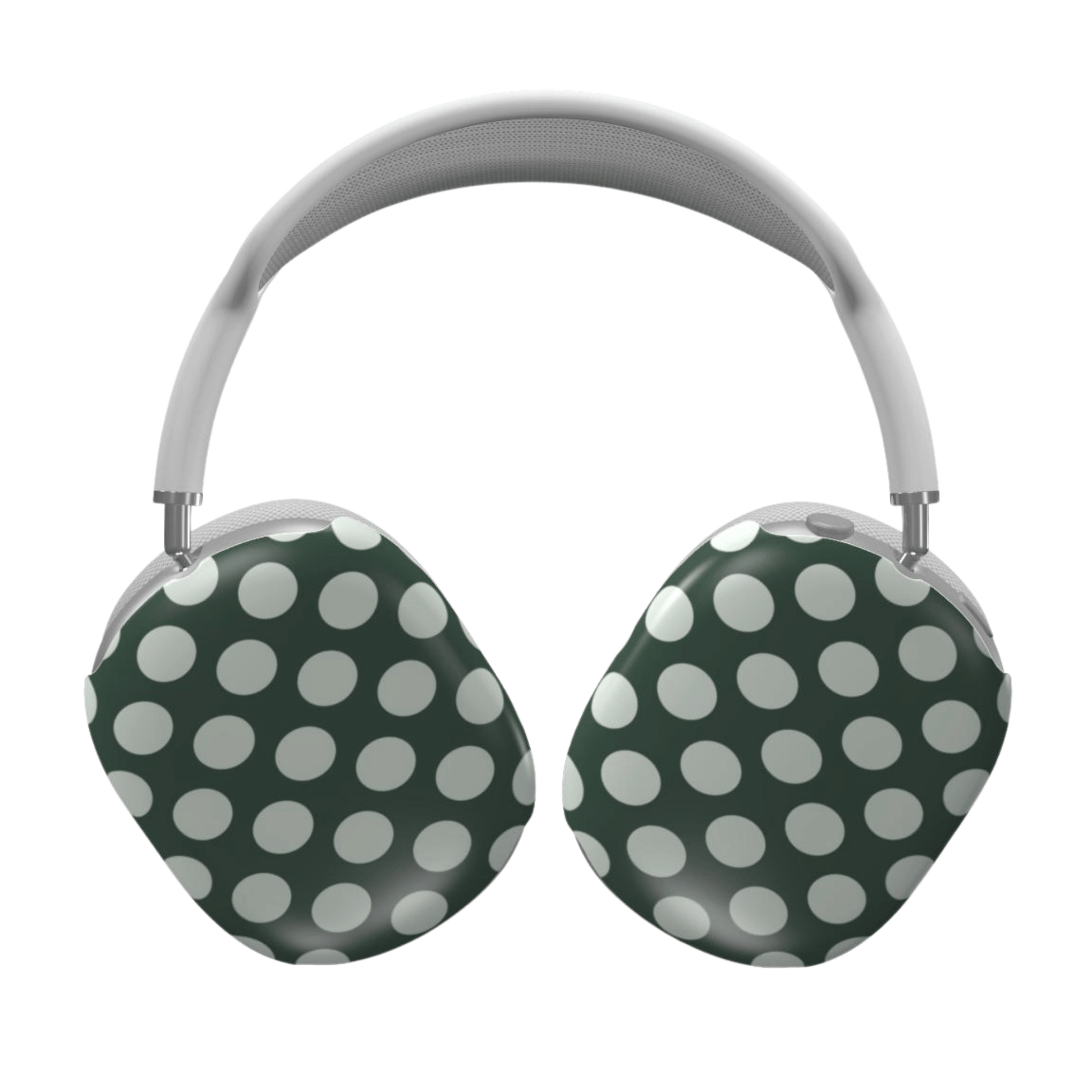 Green and white polka dot headphones on a white background