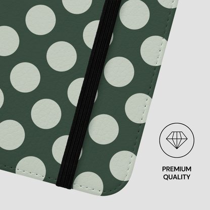 Polka dot patterned product with a 'Premium Quality' label on a green background