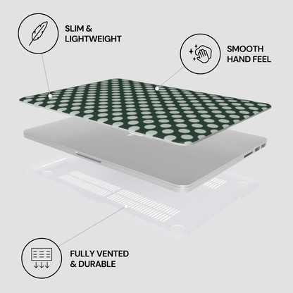 Laptop with a green and white patterned cover on a light gray background, featuring icons and text about product features.
