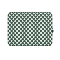 Polka dot patterned pouch on a white background