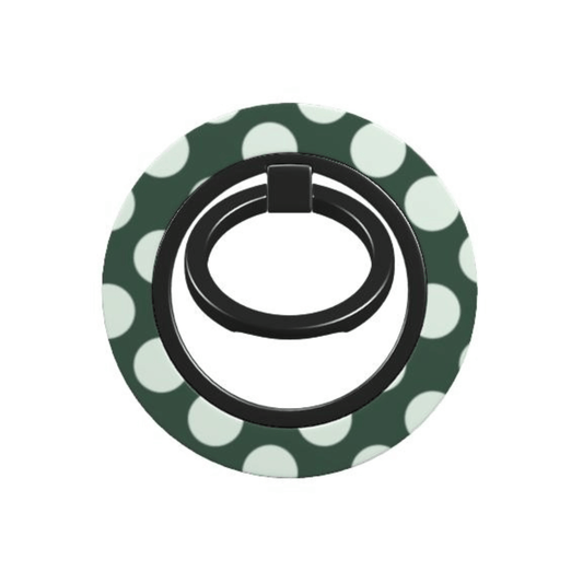 Black phone ring holder on a green and white polka dot background