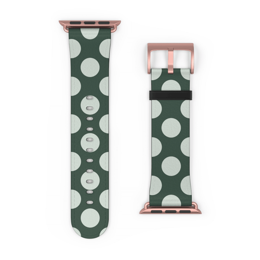 Two green watch straps with white polka dots and rose gold hardware on a white background