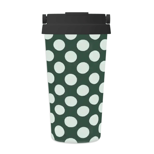 Green tumbler with white polka dots and black lid on a white background
