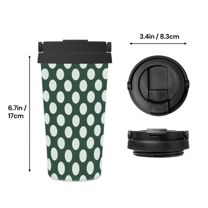 Green travel mug with white polka dots and black lid measurements on a white background