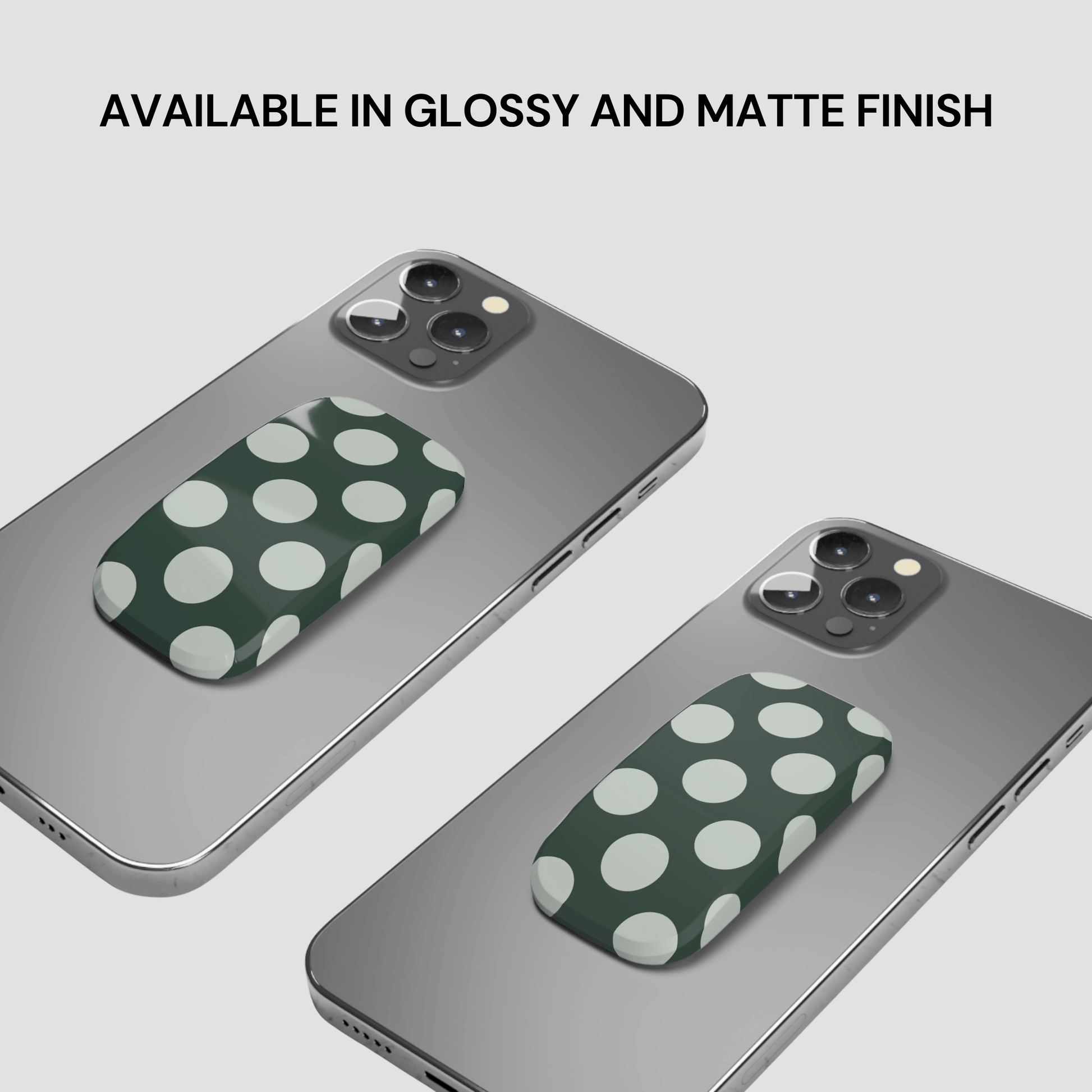 Two phone cases with green polka dot design on a gray background