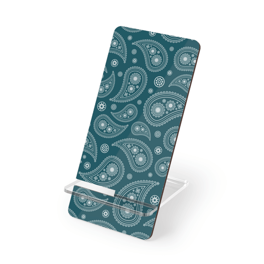 Phone stand with teal and white paisley pattern on a white background