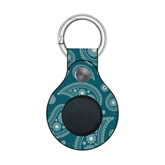 Keychain with teal patterned design on a white background