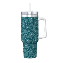 Teal patterned tumbler with a handle and straw on a white background