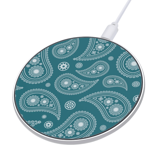 Round wireless charging pad with paisley pattern on a teal background