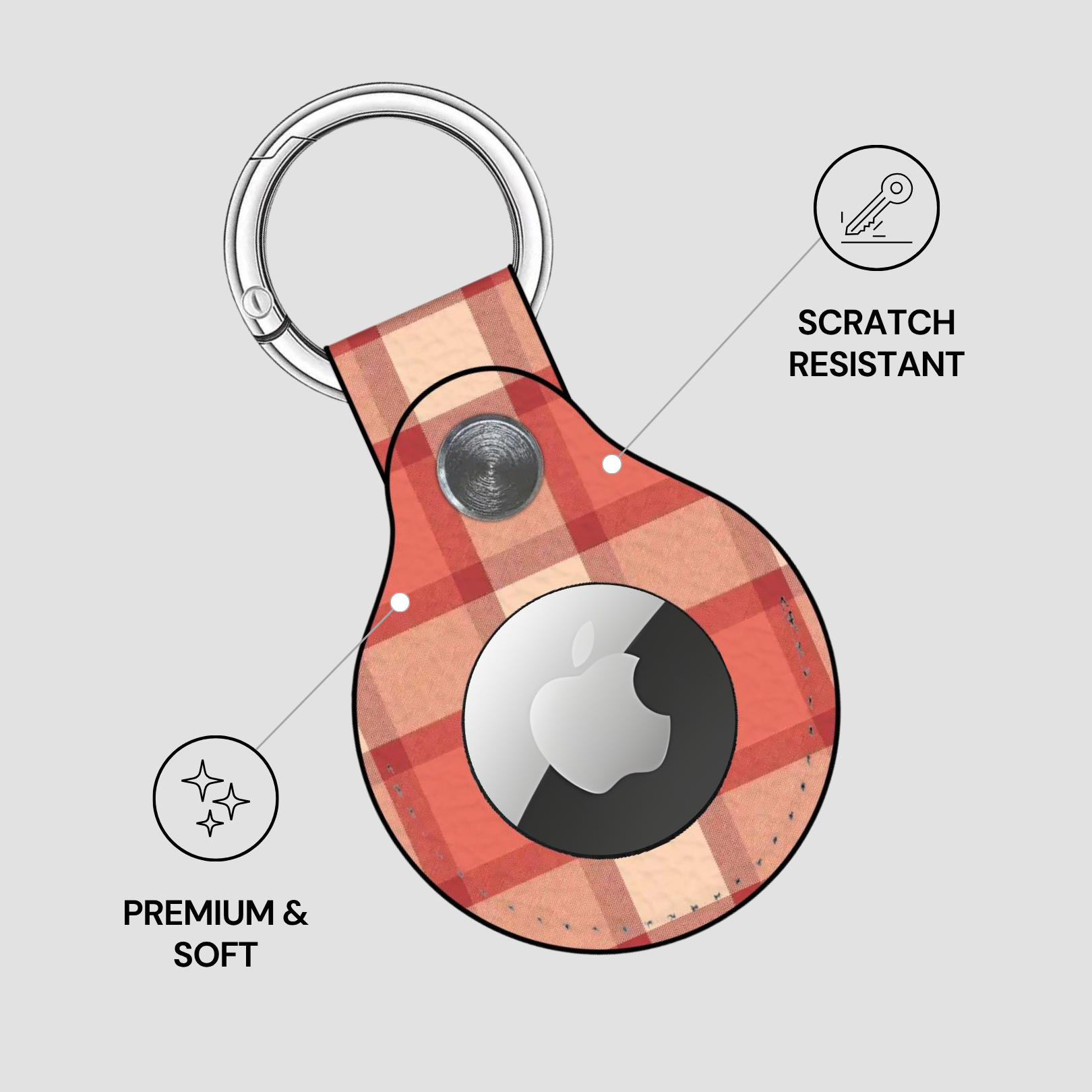 Plaid patterned keychain case with Apple logo on a light gray background