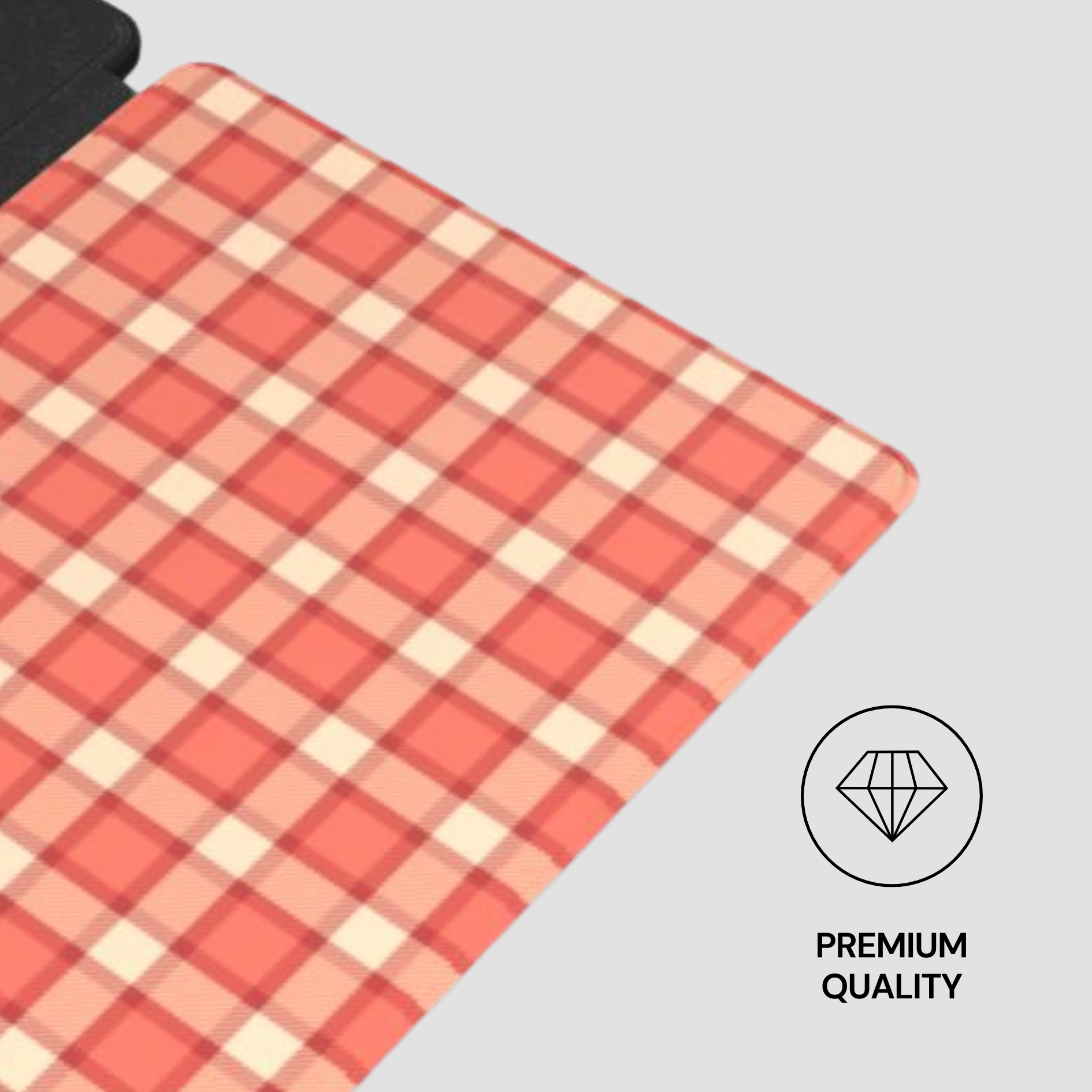 Plaid patterned mat with a 'Premium Quality' label on a gray background