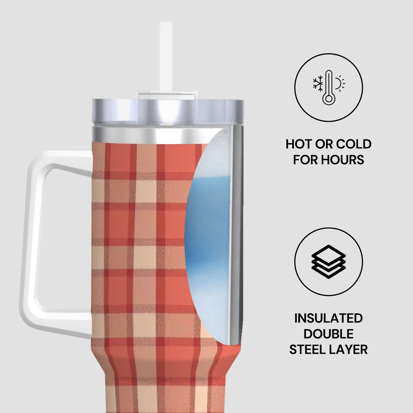Plaid-patterned insulated tumbler with a straw on a light gray background