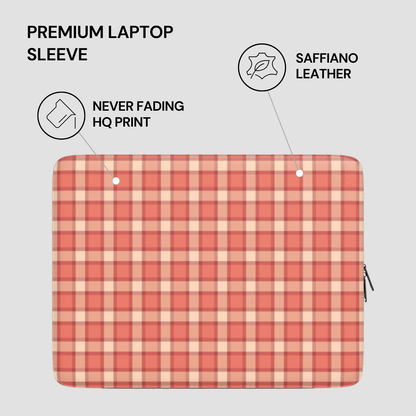 Plaid patterned laptop sleeve with text highlighting features on a gray background
