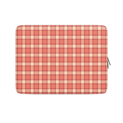 Red and beige checkered laptop sleeve on a white background