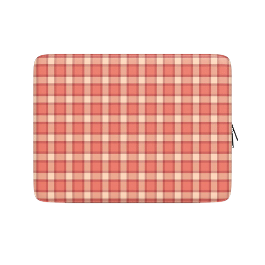 Red and beige checkered laptop sleeve on a white background