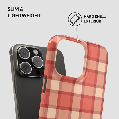 Plaid patterned phone case with text highlighting features on a gray background