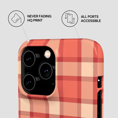 Plaid patterned phone case with features highlighted on a light gray background
