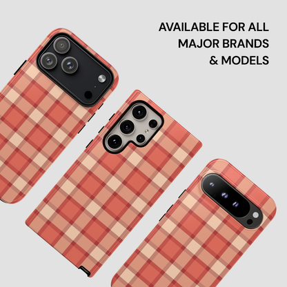 Plaid patterned phone cases on a light gray background with text about compatibility.