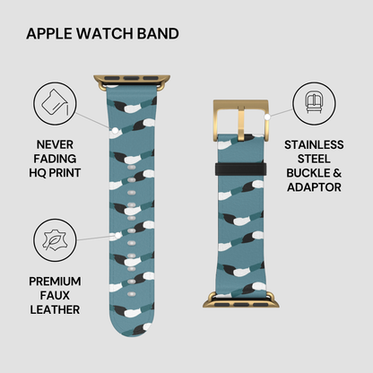 Blue patterned Apple Watch band with stainless steel buckle and adapter on a light gray background