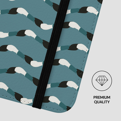 Patterned product with a black strap and 'Premium Quality' label on a teal background