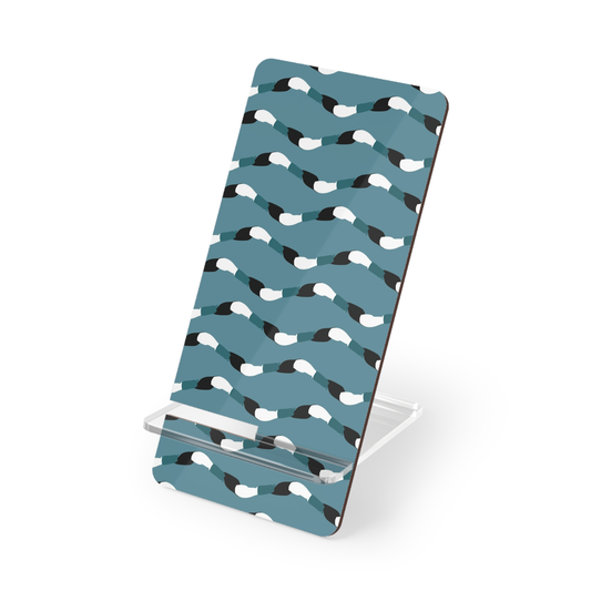 Phone stand with blue and black wavy pattern on a white background