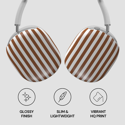 Headphones with brown and white striped design on a light gray background