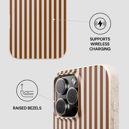 Phone case with brown and white stripes and text indicating wireless charging and raised bezels.