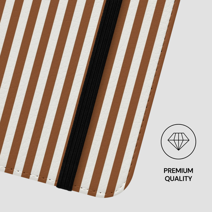 Striped fabric with brown and white stripes on a gray background, featuring a 'Premium Quality' label.