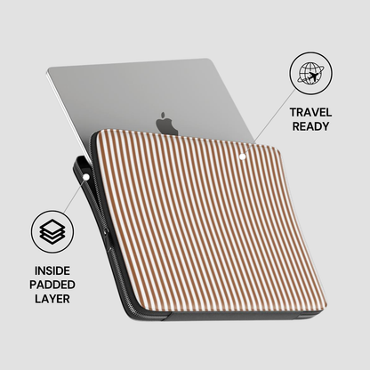 Striped laptop sleeve with Apple logo on a gray background